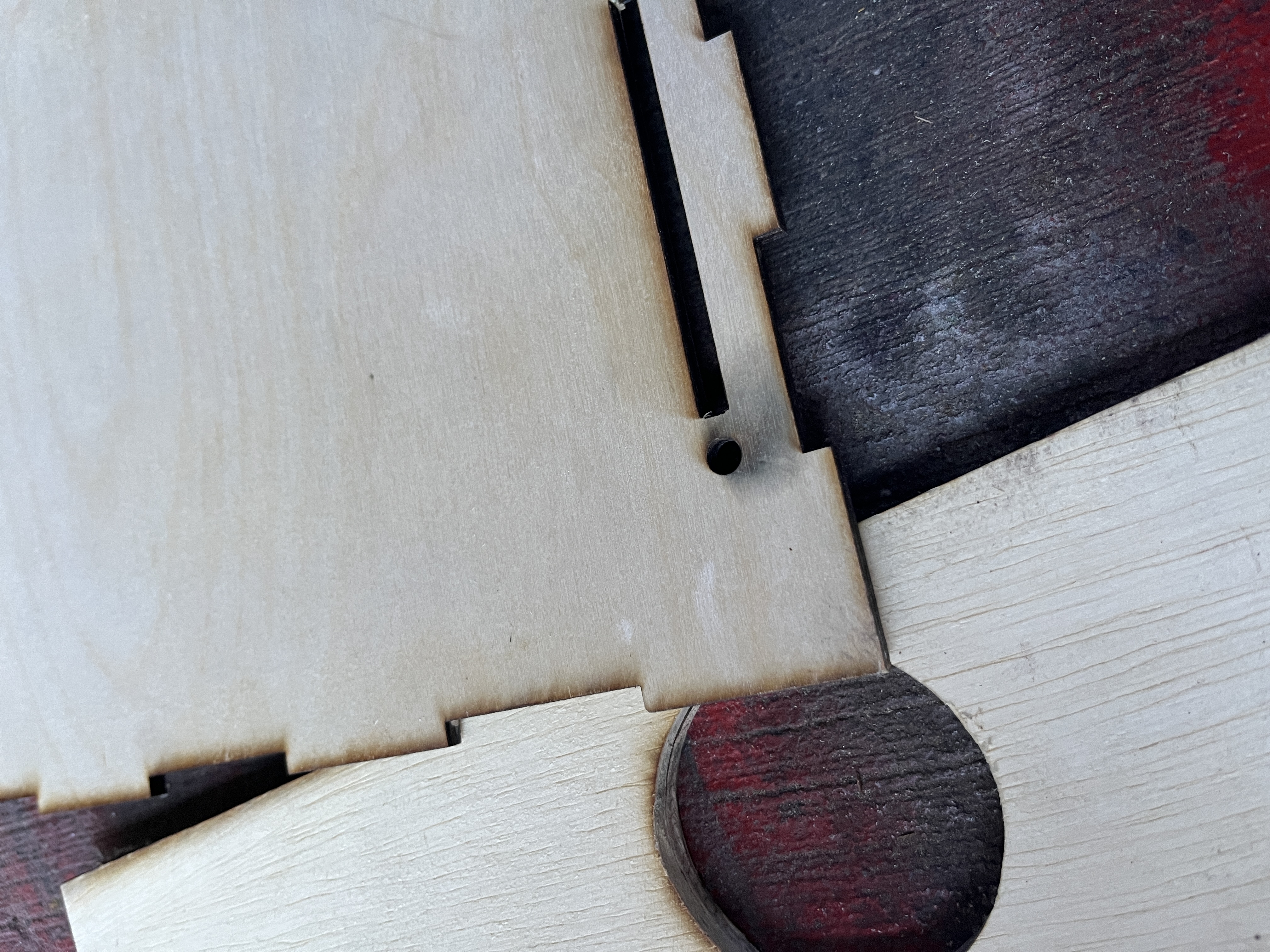Scorch marks on wood from laser cutting